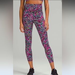 Lululemon Base Pace High-Rise Tights Leggings 25"
Floral Electric Multi size 4